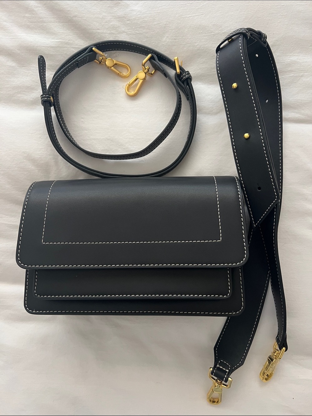 Black Leather Crossbody Bag with Gold Hardware and White Topstitching